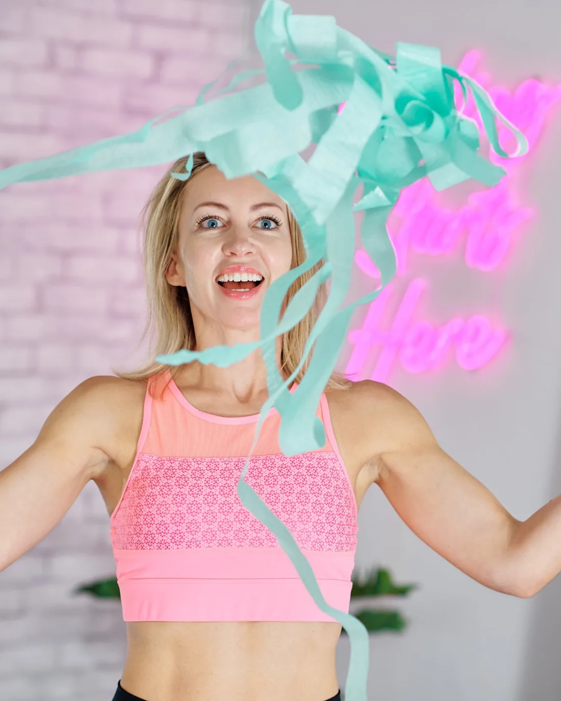 Emma throwing streamers in the air